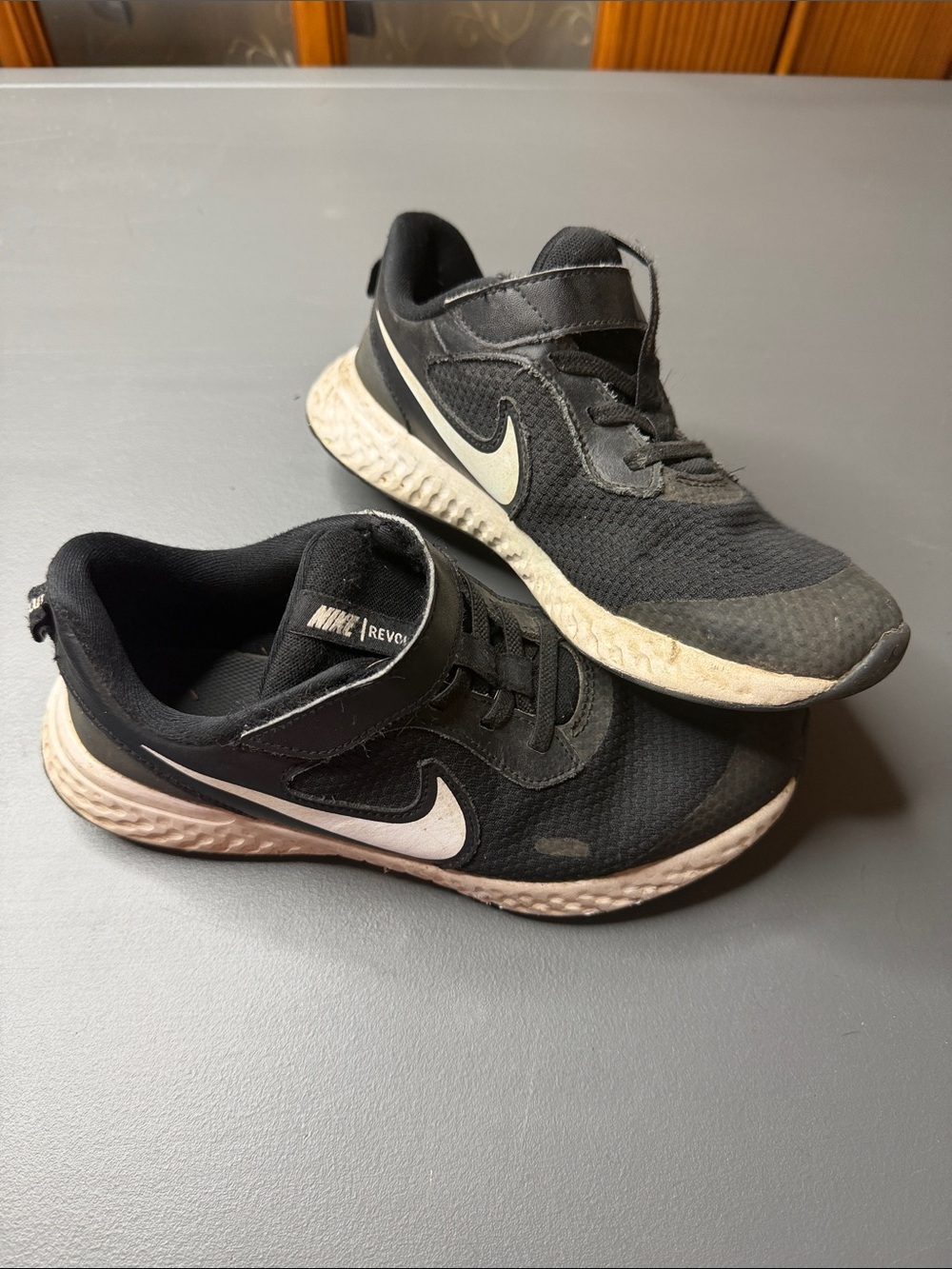 Kids Nike Black Athletic Sneakers with Hook-and-Loop closure. Great for play!